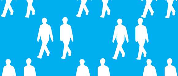 Blue block with people walking alongside each other