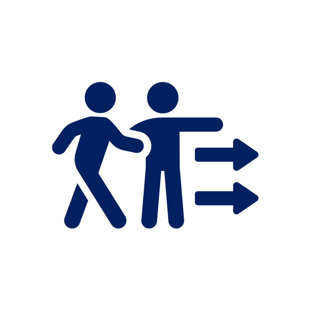 Image of two people heading in one direction