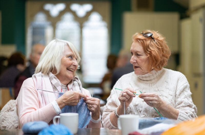 2 Middle aged women knitting