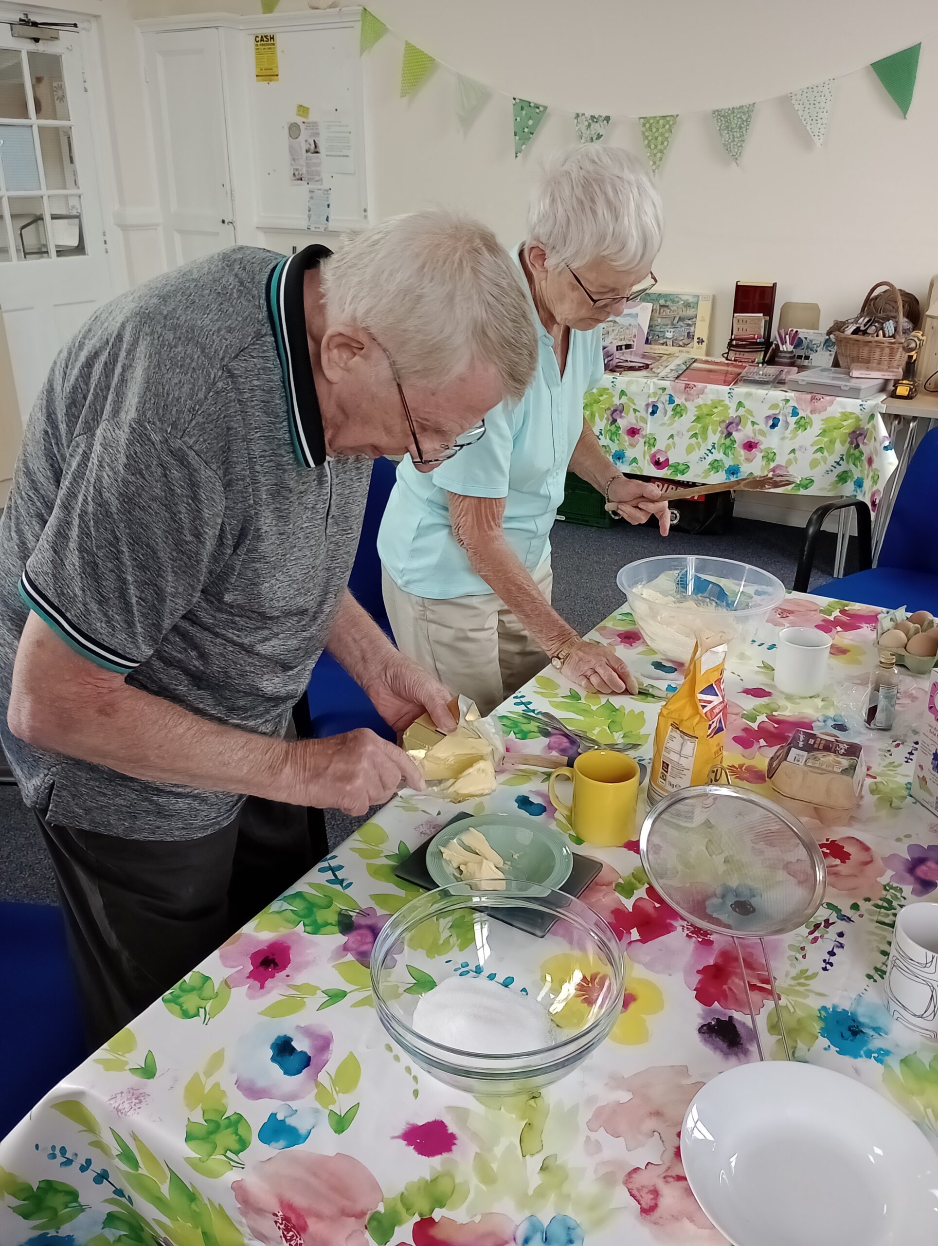 man and woman baking