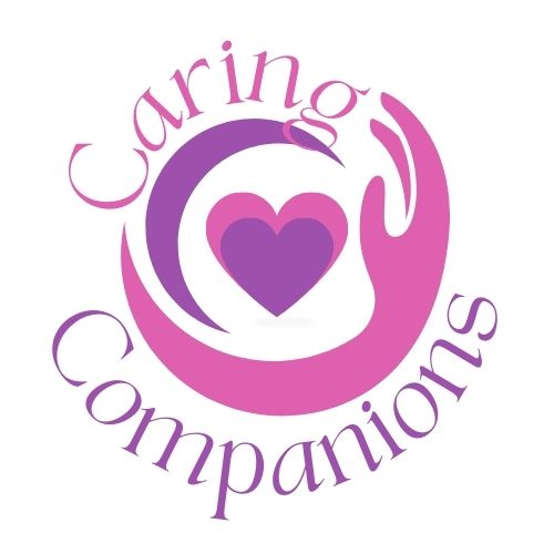 Caring Companions logo is a graphic with caring arms around a heart. 