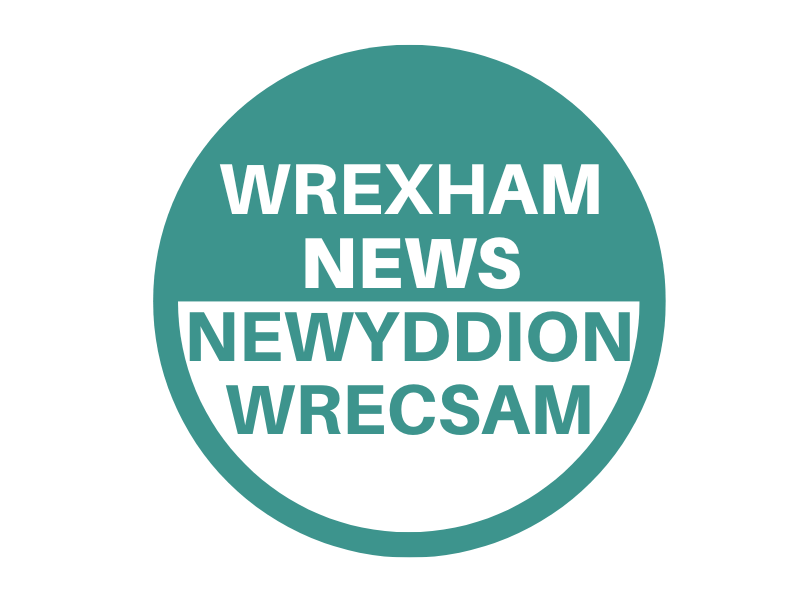 Green circle reading 'Wrexham news/Newyddion Wrecsam'