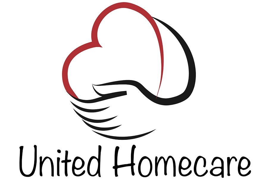 A hand holding a red heart with United Homecare underneath it. 