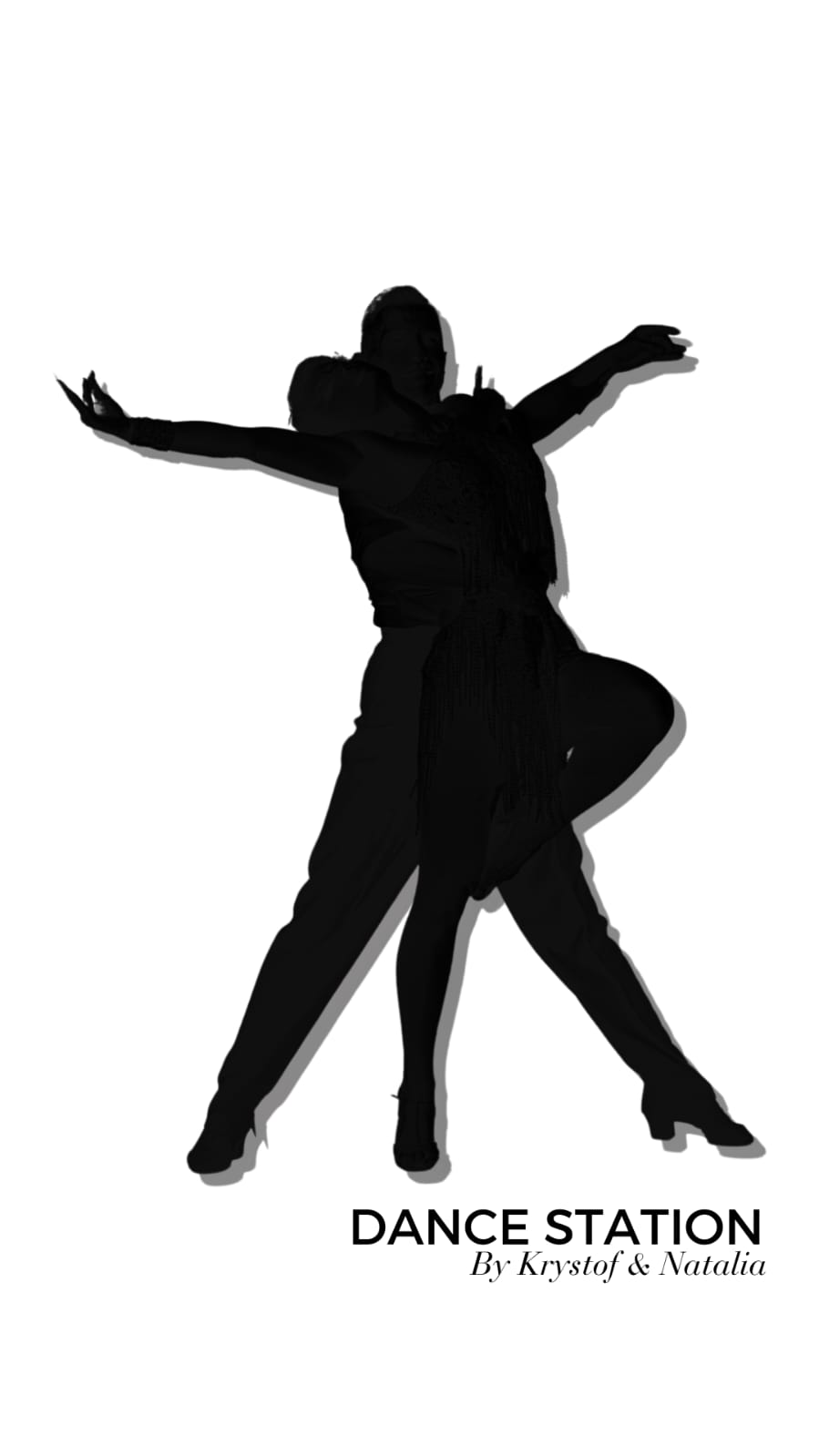 silhouette of two dancers 