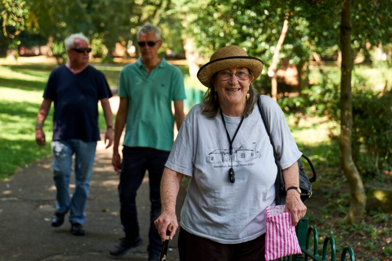 Photo of people walking along a path