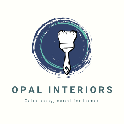 Opal Interiors logo: Paint brush in a navy blue circle with cream background