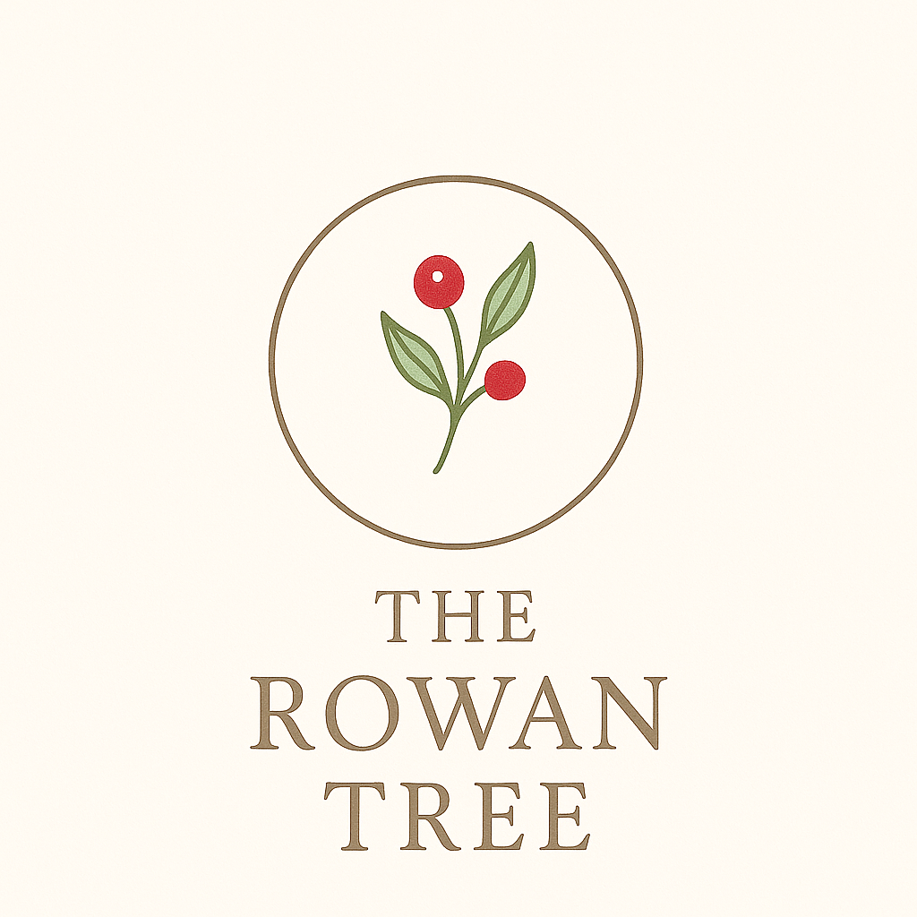 “Logo for The Rowan Tree showing a rowan berry branch with red berries and green leaves inside a circle above the words ‘The Rowan Tree’.