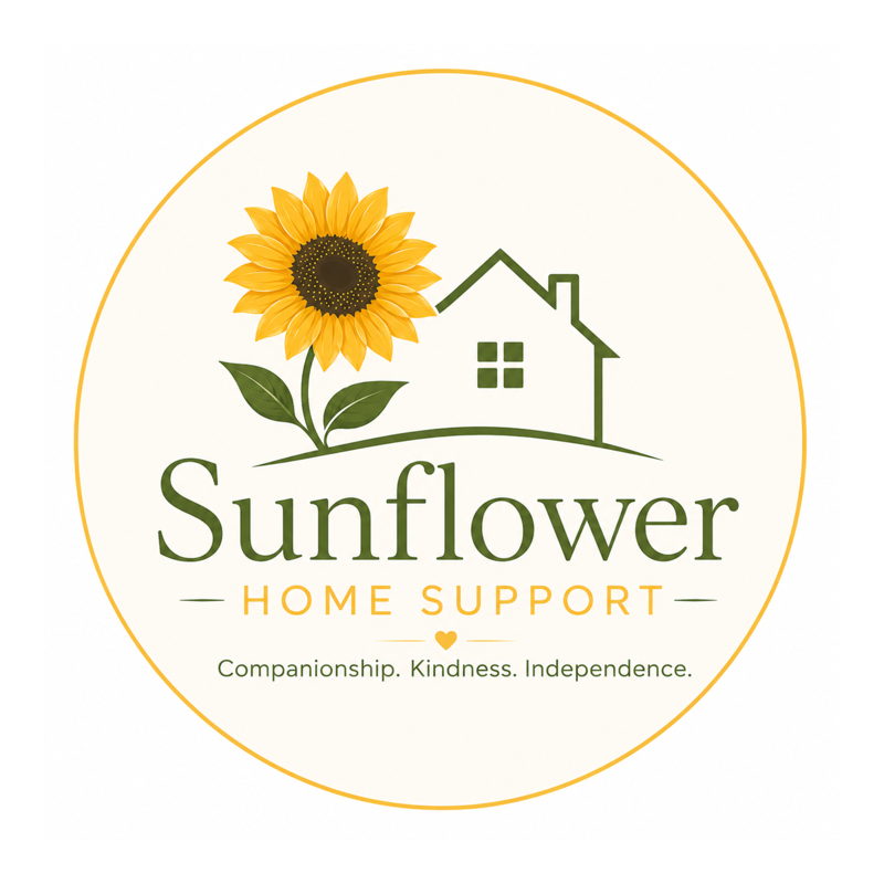 Sunflower Home Support logo featuring a sunflower within a heart-shaped home design, with the company name displayed below. The logo uses warm yellow and green colours to represent companionship, kindness, independence, and practical support for people living at home