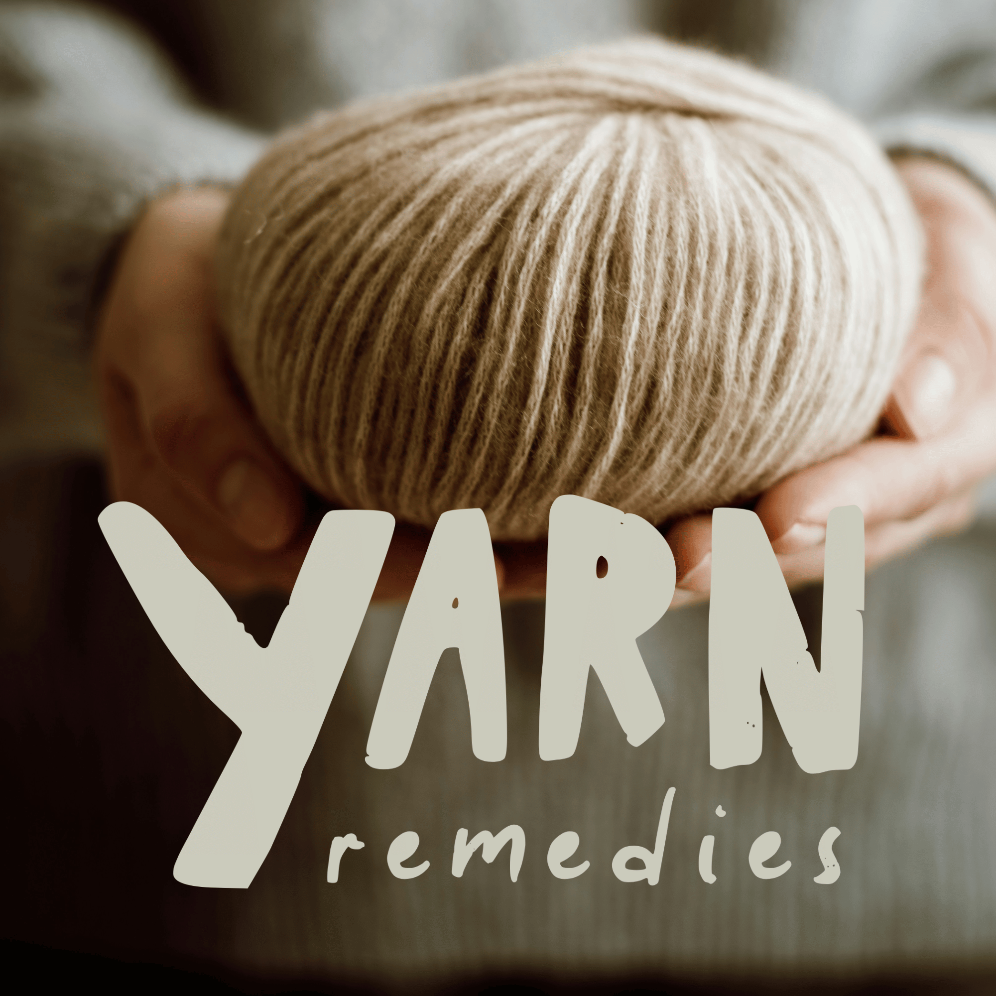 Company logo for Yarn Remedies with lettering in purple text against a neutral background
