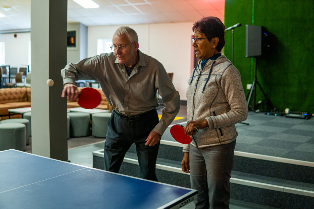 People playing table tennis