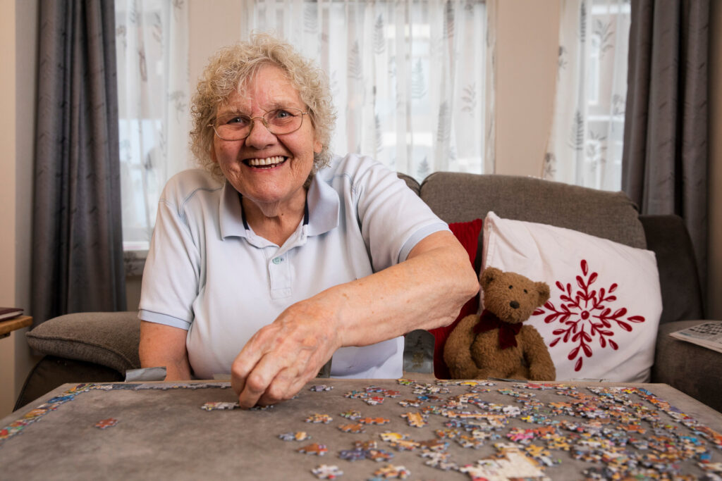 Woman doing jigsaw