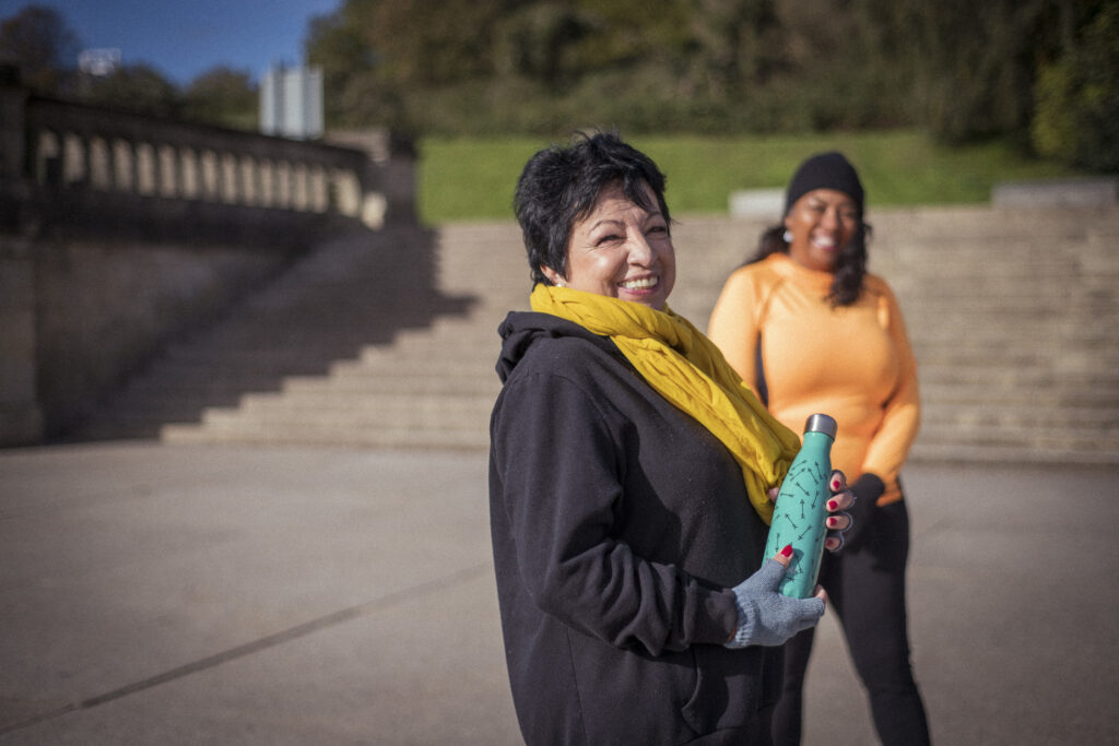 Women smiling outside, after exercise