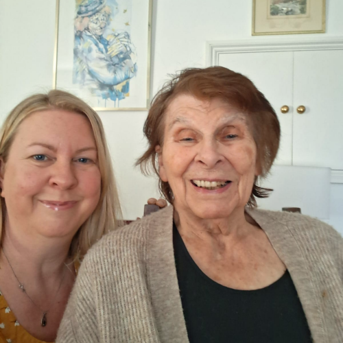 Two women smiling