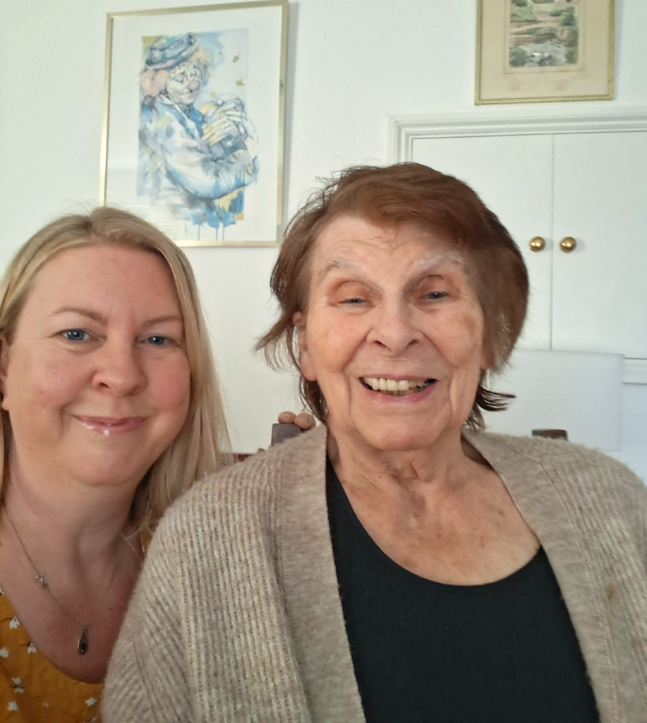 Two women smiling