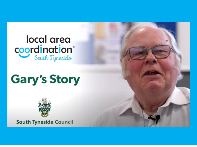 A man smiling at the camera.