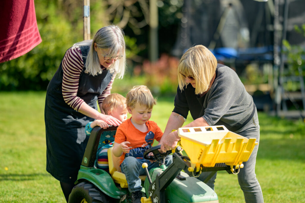 Two women and two children in a park