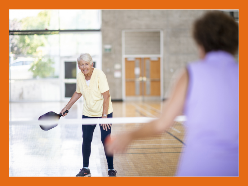 Two people playing tennis