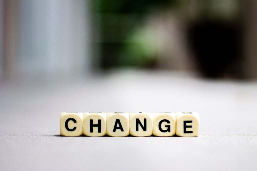 Small tiles that spell the word 'change'